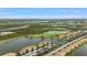 Luxury condo community with golf course and waterfront views at 7911 Grand Estuary Trl # 106, Bradenton, FL 34212