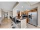 Modern kitchen with stainless steel appliances and granite counters at 7911 Grand Estuary Trl # 106, Bradenton, FL 34212