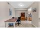 Dedicated home office space with built-in shelving at 7911 Grand Estuary Trl # 106, Bradenton, FL 34212