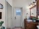 Guest bathroom with granite countertop and single sink at 8107 High Oaks Trl, Myakka City, FL 34251