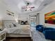Main bedroom with plush carpet, sitting area, and pool view at 8107 High Oaks Trl, Myakka City, FL 34251
