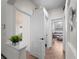 Bright hallway with access to bathroom and other rooms at 8107 High Oaks Trl, Myakka City, FL 34251