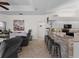 Modern kitchen with a stone breakfast bar and stainless steel appliances at 8107 High Oaks Trl, Myakka City, FL 34251
