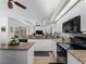 Spacious kitchen with granite countertops and island at 8107 High Oaks Trl, Myakka City, FL 34251