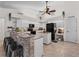 Modern kitchen with granite countertops and white cabinets at 8107 High Oaks Trl, Myakka City, FL 34251