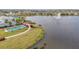 Pathway along the lake, leading to community amenities at 8635 Ocean Tides Cv, Parrish, FL 34219