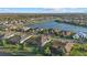 Luxury homes situated around a picturesque lake at 9020 Artisan Way, Sarasota, FL 34240