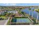 Community amenities including pool, playground, and basketball court at 9020 Artisan Way, Sarasota, FL 34240