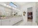 Elegant bathroom with double vanity and walk-in shower at 9020 Artisan Way, Sarasota, FL 34240