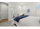 Comfortable bedroom with an ensuite bathroom and a workspace at 9020 Artisan Way, Sarasota, FL 34240