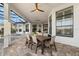 Outdoor patio with table and chairs, perfect for dining al fresco at 9020 Artisan Way, Sarasota, FL 34240