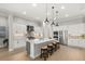 Modern kitchen featuring a large island, stainless steel appliances, and white cabinets at 9020 Artisan Way, Sarasota, FL 34240