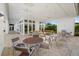 Relaxing outdoor lounge with seating and tables at 9020 Artisan Way, Sarasota, FL 34240