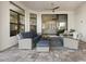 Outdoor patio with seating and access to the kitchen at 9020 Artisan Way, Sarasota, FL 34240