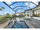 Relaxing pool and spa with a covered patio and scenic view at 9020 Artisan Way, Sarasota, FL 34240
