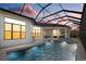 Stunning pool and patio at sunset, offering a relaxing outdoor space at 9020 Artisan Way, Sarasota, FL 34240