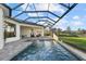 Resort-style pool with covered patio and comfortable seating at 9020 Artisan Way, Sarasota, FL 34240
