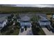 Aerial view of a waterfront community with single-Gathering homes at 919 Waterside Ln, Bradenton, FL 34209
