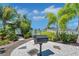 Community grilling area with landscaping at 919 Waterside Ln, Bradenton, FL 34209
