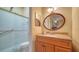 Updated bathroom with vanity and walk-in shower at 919 Waterside Ln, Bradenton, FL 34209