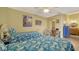 Guest bedroom with twin beds, built-in workspace, and bathroom access at 919 Waterside Ln, Bradenton, FL 34209