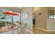 Bright breakfast nook with glass table and patio view at 919 Waterside Ln, Bradenton, FL 34209