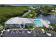 Community clubhouse with pool and parking at 919 Waterside Ln, Bradenton, FL 34209