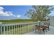 Relaxing deck with seating overlooks tranquil nature views at 919 Waterside Ln, Bradenton, FL 34209