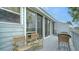 Spacious deck with wicker furniture, offering scenic views at 919 Waterside Ln, Bradenton, FL 34209