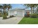 Two-car garage and nicely landscaped front yard at 919 Waterside Ln, Bradenton, FL 34209