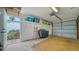 Garage with storage shelves and extra space at 919 Waterside Ln, Bradenton, FL 34209