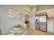 Modern kitchen with stainless steel appliances and breakfast bar at 919 Waterside Ln, Bradenton, FL 34209