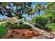 Landscaped walkway to community features at 919 Waterside Ln, Bradenton, FL 34209