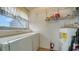 Laundry room with washer, dryer, and extra storage at 919 Waterside Ln, Bradenton, FL 34209