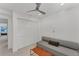 Small guest room with closet and sofa at 100 Sands Point Rd # 323, Longboat Key, FL 34228
