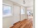 Simple entryway with white door and wood-look flooring at 1003 Patterson Dr, Sarasota, FL 34234