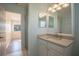 Charming bathroom with light-colored vanity and a shower at 1178 Fraser Pine Blvd, Sarasota, FL 34240
