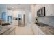 Updated kitchen with stainless steel appliances and granite at 1178 Fraser Pine Blvd, Sarasota, FL 34240