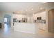 Open kitchen features granite countertops and island at 1178 Fraser Pine Blvd, Sarasota, FL 34240