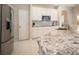 Modern kitchen with granite countertops and stainless steel appliances at 1178 Fraser Pine Blvd, Sarasota, FL 34240