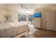 Spacious main bedroom with a king-size bed, built-in dresser, and home office at 1178 Fraser Pine Blvd, Sarasota, FL 34240