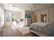 Spacious main bedroom with a king-size bed, built-in dresser, and home office at 1178 Fraser Pine Blvd, Sarasota, FL 34240