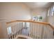 View from upper level overlooking the foyer and entrance at 1178 Fraser Pine Blvd, Sarasota, FL 34240