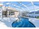 Relaxing pool area with screened enclosure and home view at 1178 Fraser Pine Blvd, Sarasota, FL 34240