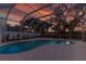 Evening view of the pool area with sunset colors at 1178 Fraser Pine Blvd, Sarasota, FL 34240
