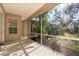 Bright screened porch overlooking backyard at 1178 Fraser Pine Blvd, Sarasota, FL 34240