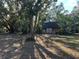 Spacious backyard with a shed and grassy area at 121 Christie Ave, Sarasota, FL 34232