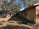 Ranch home with mature trees and a spacious yard at 121 Christie Ave, Sarasota, FL 34232