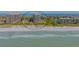 Beachfront property with luxurious high-rise building and white sand beach at 1211 Gulf Of Mexico Dr # 603, Longboat Key, FL 34228