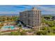 Luxury beachfront condo building with pool and ocean views at 1211 Gulf Of Mexico Dr # 603, Longboat Key, FL 34228
